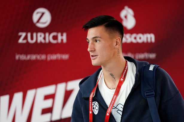 Benjamin Sesko of Slovenia arrives